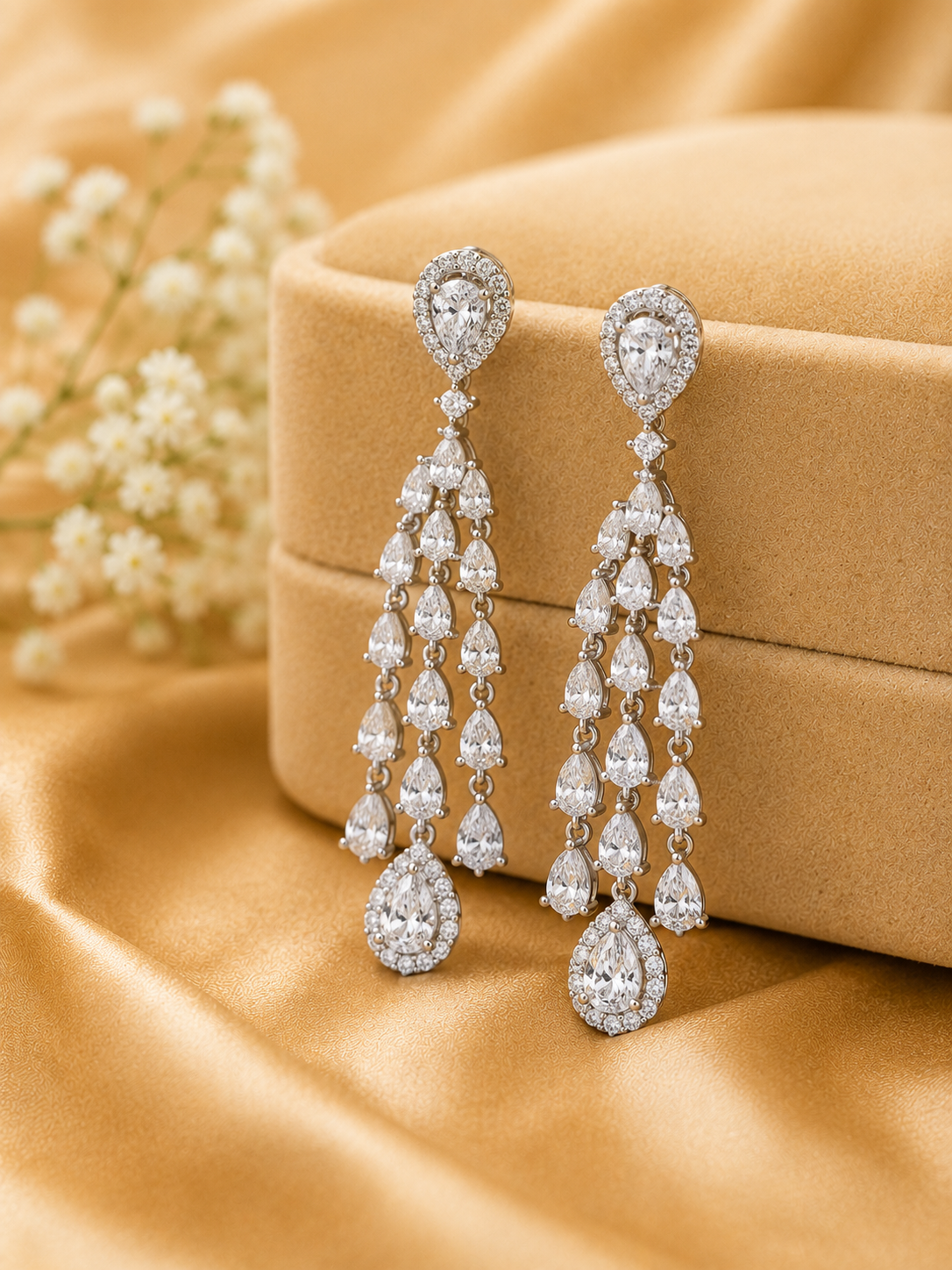 Diamond drop earrings in cascading waterfall design